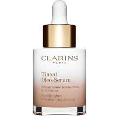 Imagen de Clarins Tinted Oleo-Serum Base de maquillaje con tratamiento de textura fluida para rostro radiante uniforme y nutritivo
